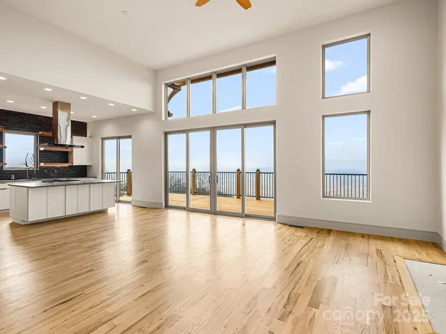 a view of an entryway with a kitchen