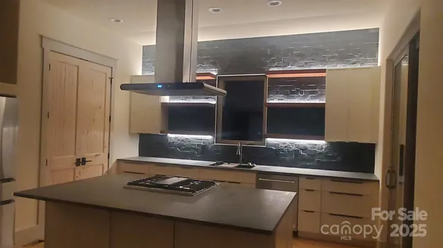 a balcony with wooden floor and city view