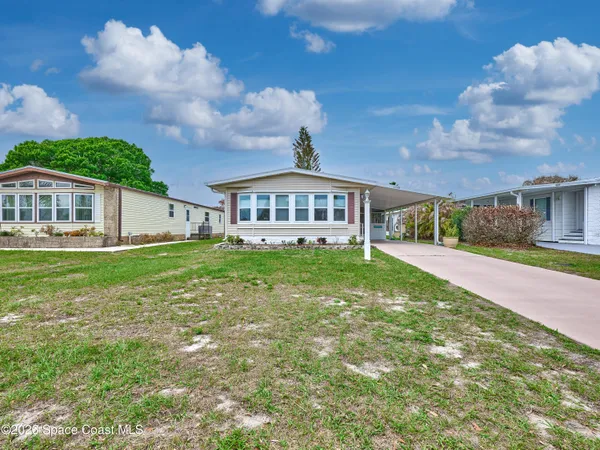 $199,000 | 1228 Gardenia Drive, Barefoot Bay, FL 32976