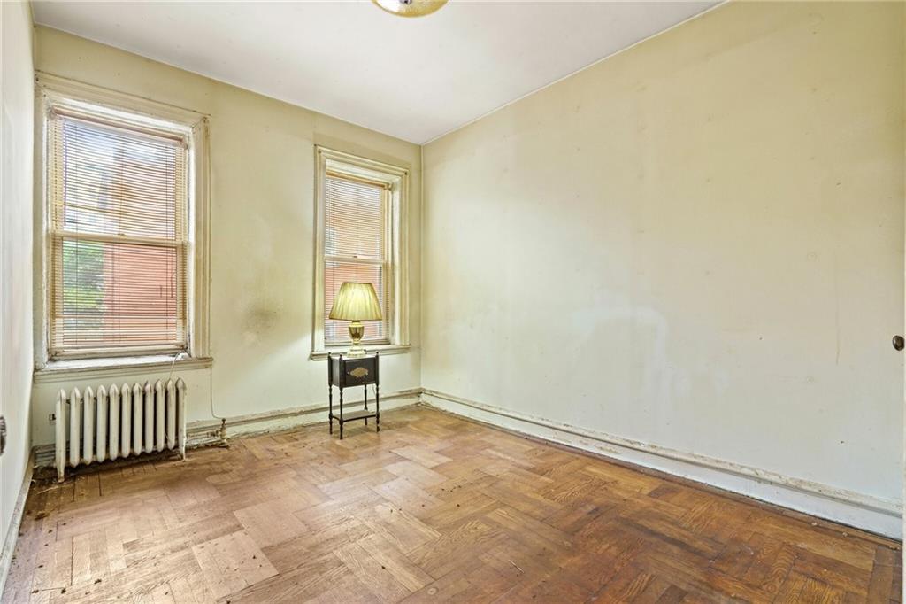 282 Buffalo Avenue Brooklyn, NY 11213 - Photo 14 of 22 an empty room with windows