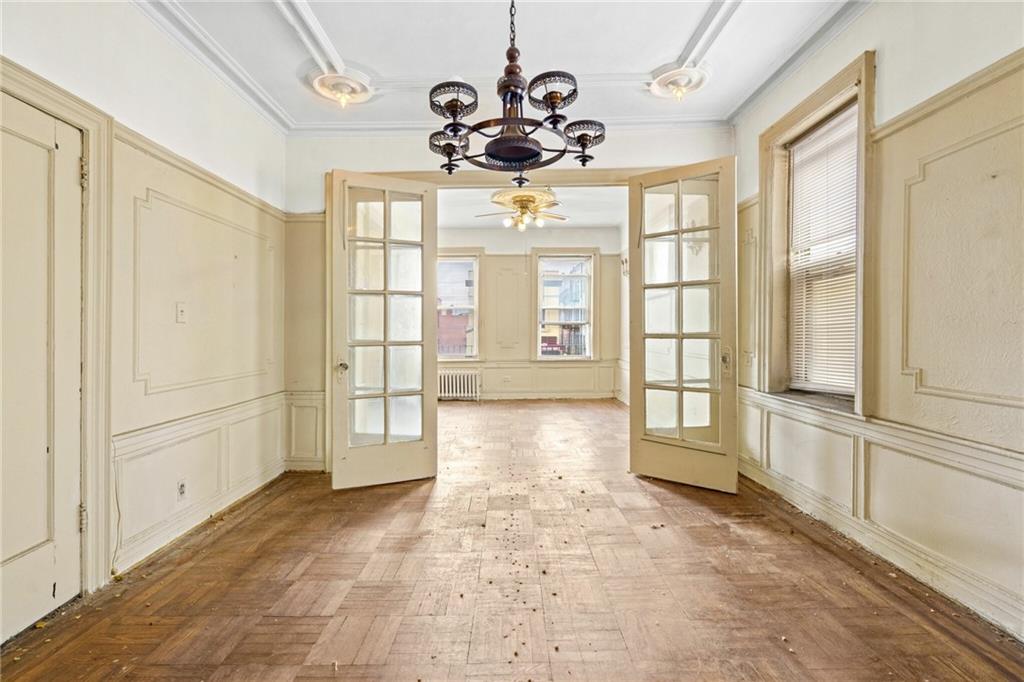 282 Buffalo Avenue Brooklyn, NY 11213 - Photo 7 of 22 a view of an entryway with a chandelier