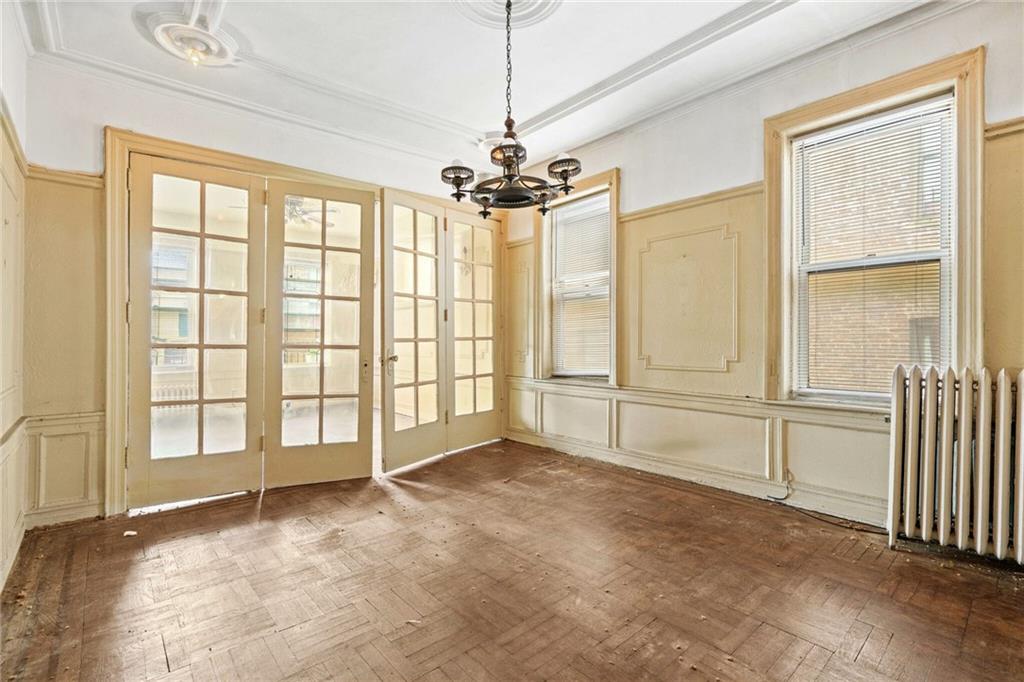 282 Buffalo Avenue Brooklyn, NY 11213 - Photo 8 of 22 a view of an empty room with a window