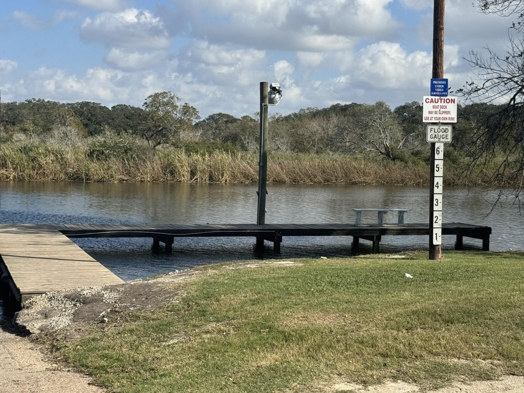 1 Riverside Drive Palacios, TX 77465 - Photo 15 of 29 a view of a water pond with green yard