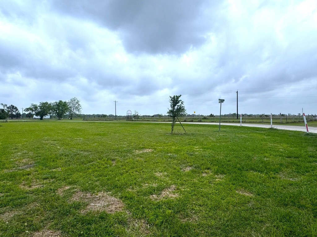 1 Riverside Drive Palacios, TX 77465 - Photo 4 of 29 a backyard of a house with lots of green space