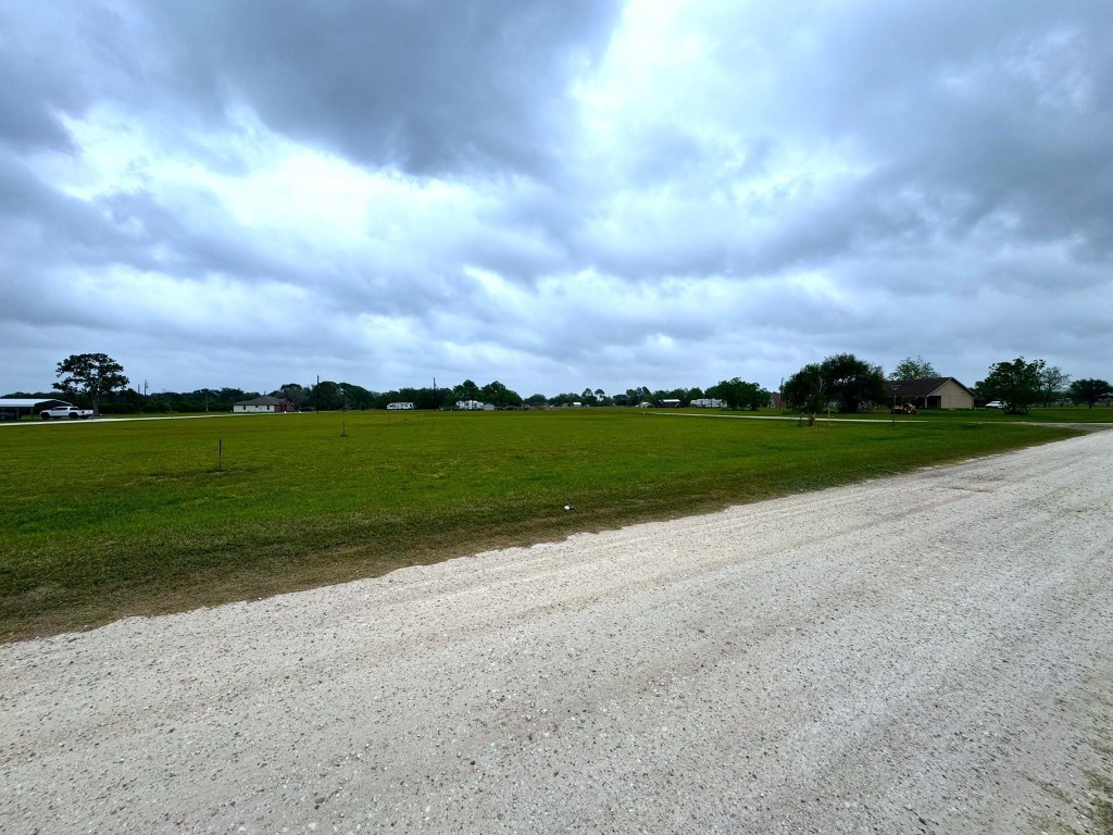 1 Riverside Drive Palacios, TX 77465 - Photo 5 of 29 a view of a lake with a big yard