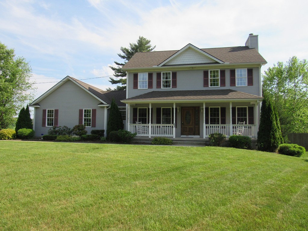63 Valley Road Southampton, MA 01073 - Photo 1 of 18 a front view of a house with a garden