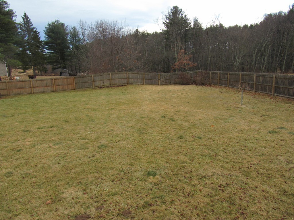 63 Valley Road Southampton, MA 01073 - Photo 17 of 18 a view of a swimming pool and trees in the background