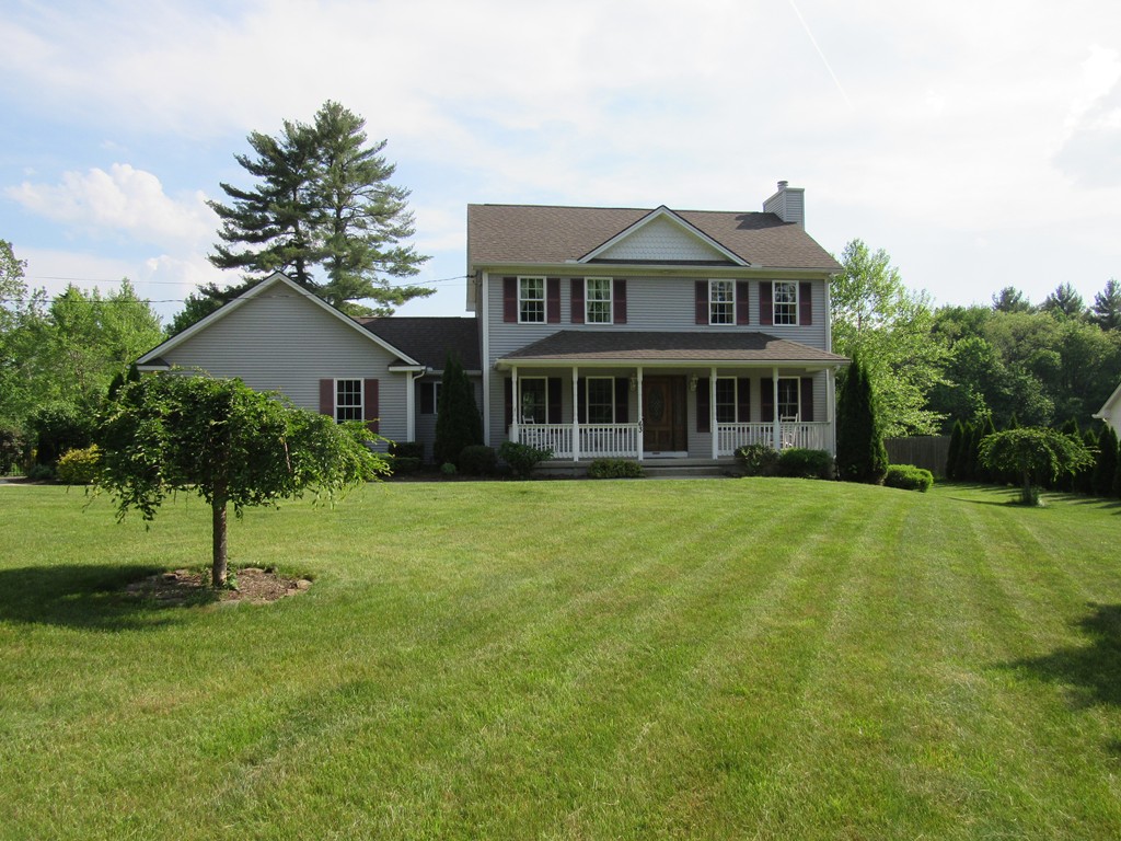 63 Valley Road Southampton, MA 01073 - Photo 2 of 18 a house view with swimming pool and garden space