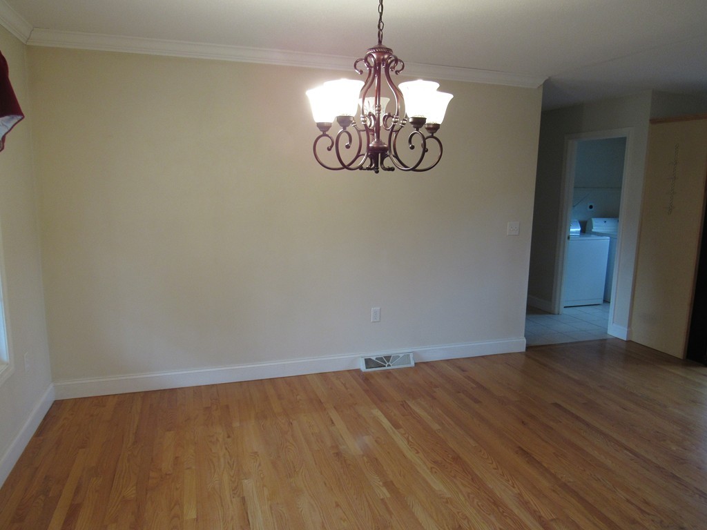 63 Valley Road Southampton, MA 01073 - Photo 6 of 18 a view of empty room with wooden floor