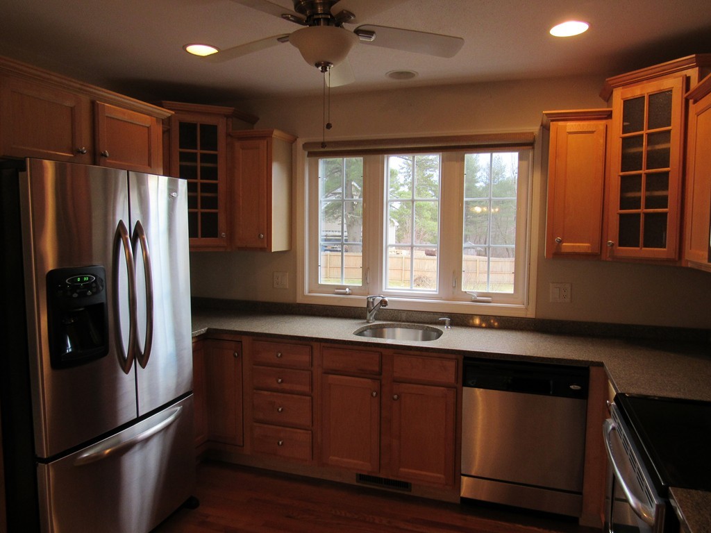 63 Valley Road Southampton, MA 01073 - Photo 8 of 18 a kitchen with stainless steel appliances granite countertop a refrigerator and a sink