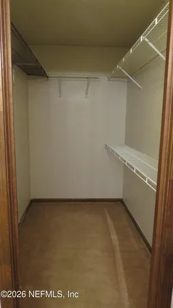 a view of an empty room with window