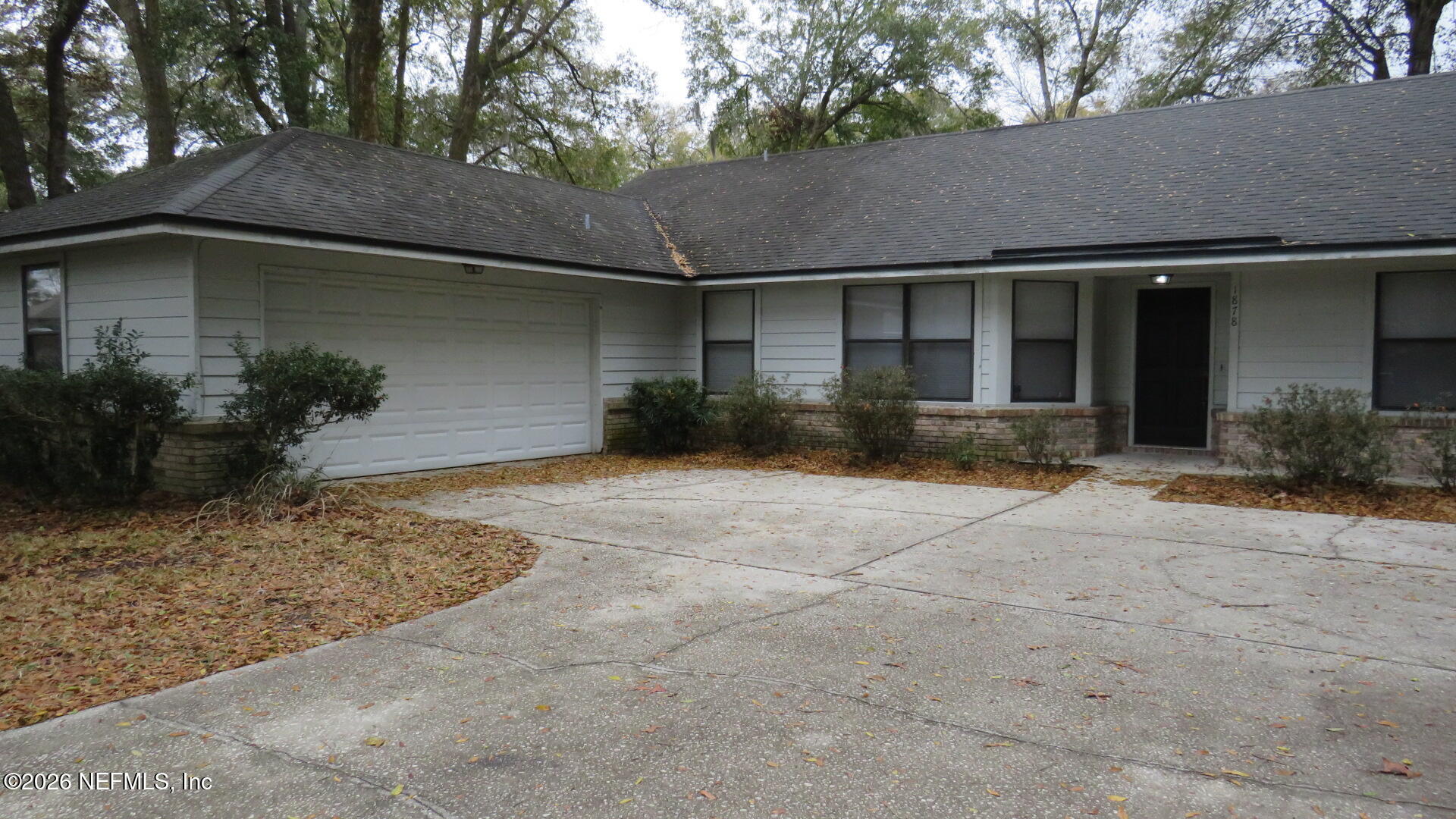 1878 Shadow Ridge Trail Jacksonville, FL 32225 - Photo 2 of 29 a front view of a house with garden