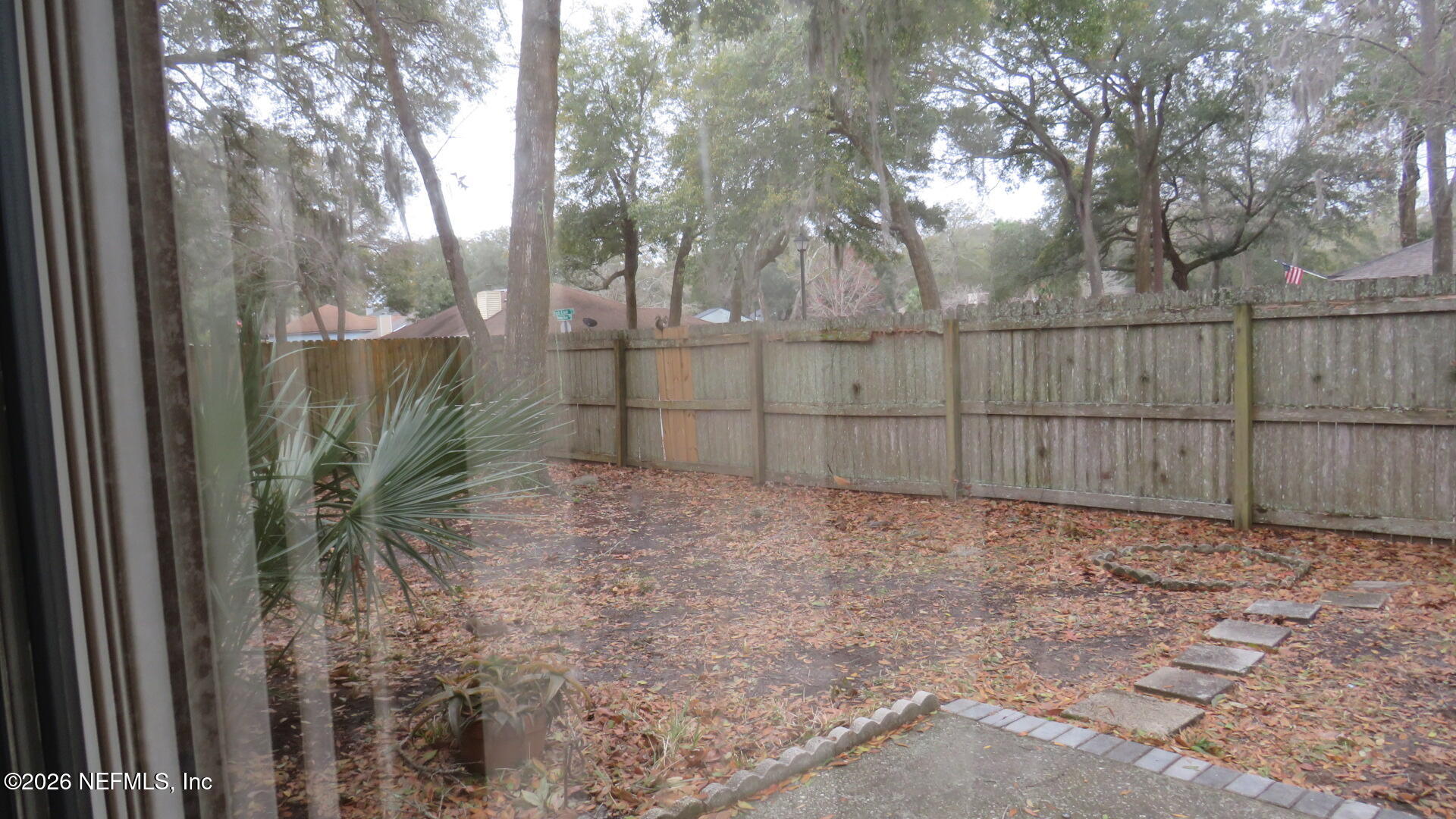 1878 Shadow Ridge Trail Jacksonville, FL 32225 - Photo 29 of 29 a backyard of a house