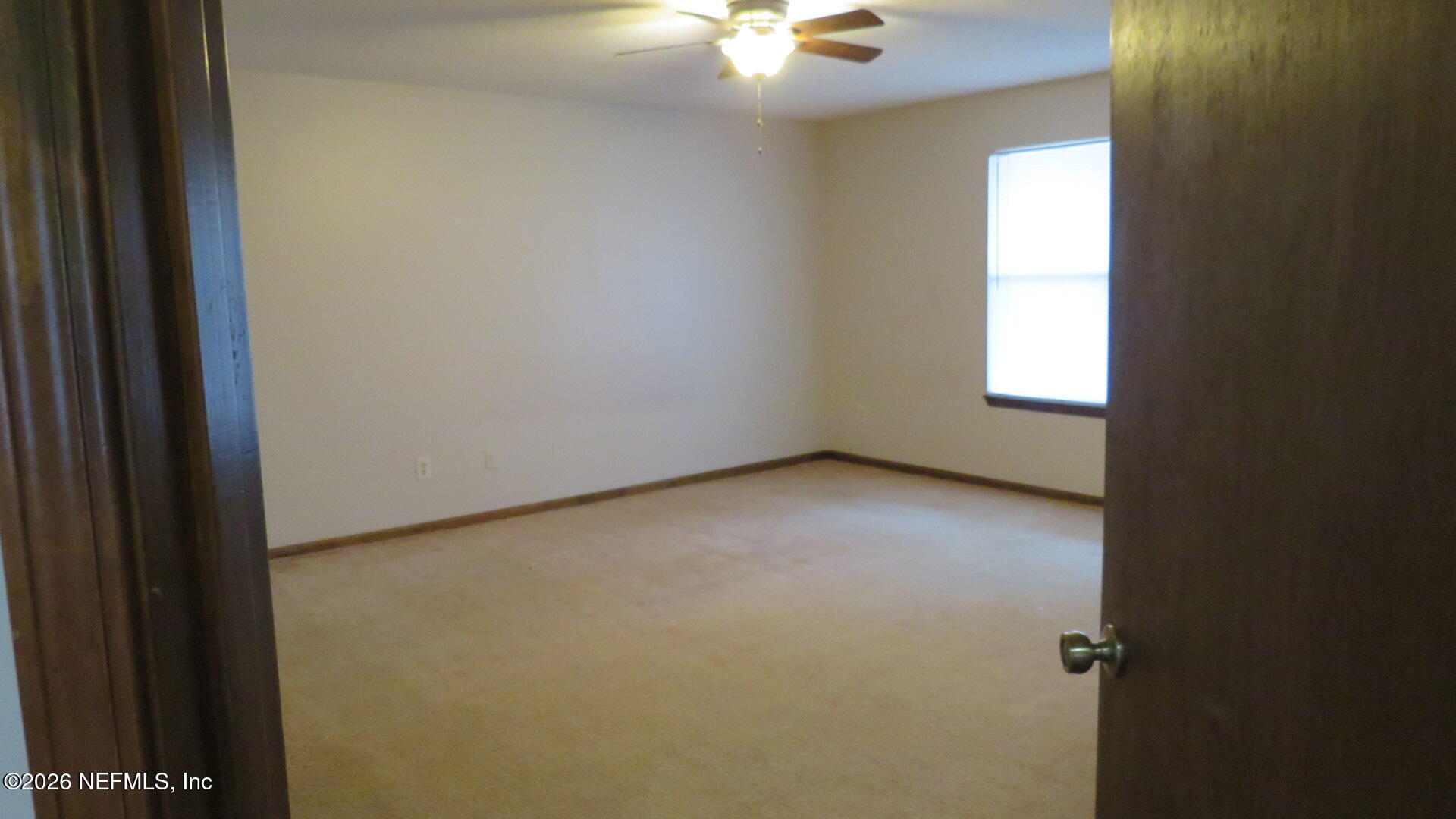 1878 Shadow Ridge Trail Jacksonville, FL 32225 - Photo 8 of 29 an empty room with a window