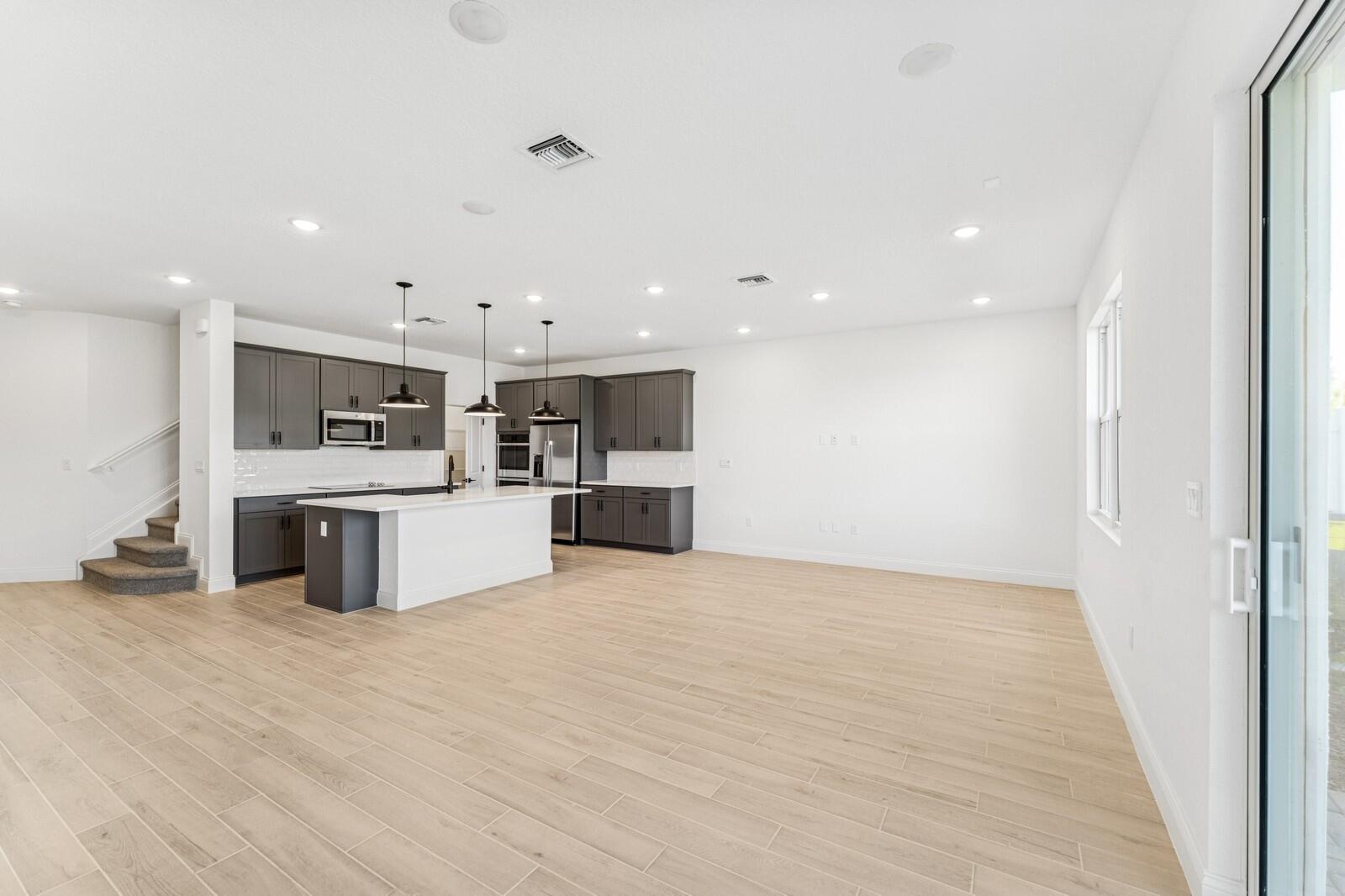 172 Southeast Birch Terrace, Unit 206 Stuart, FL 34997 - Photo 12 of 38 Kitchen, Great Room & Dining Area