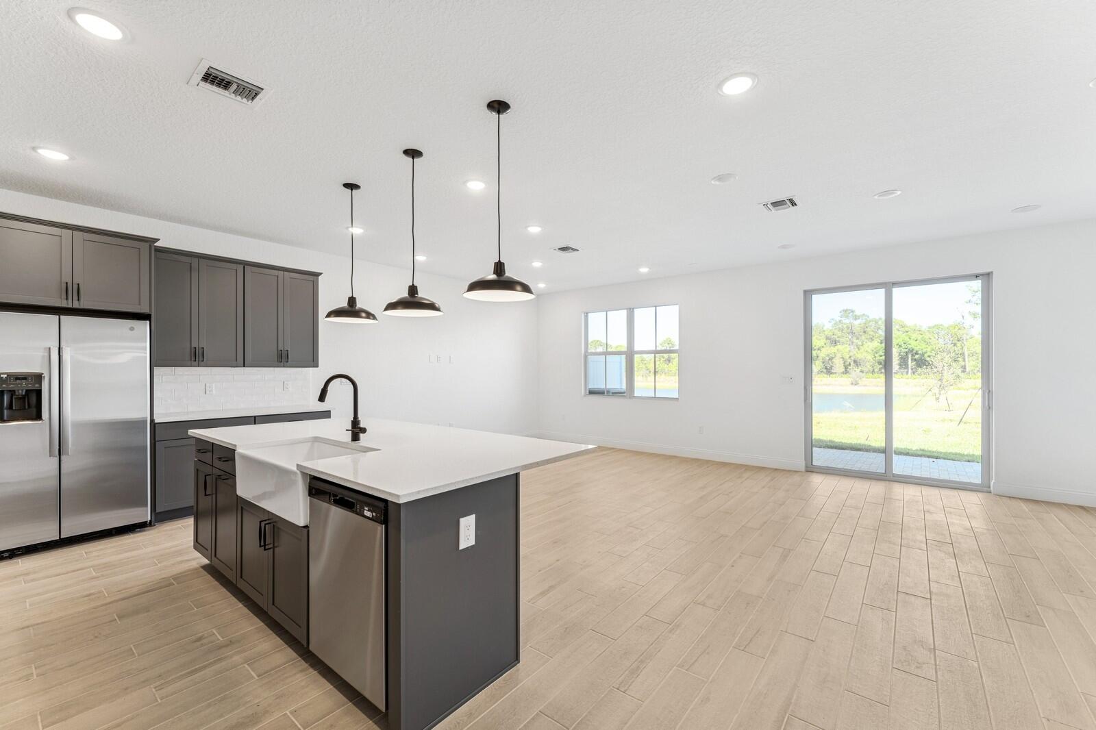 172 Southeast Birch Terrace, Unit 206 Stuart, FL 34997 - Photo 5 of 38 Kitchen, Great Room & Dining Area