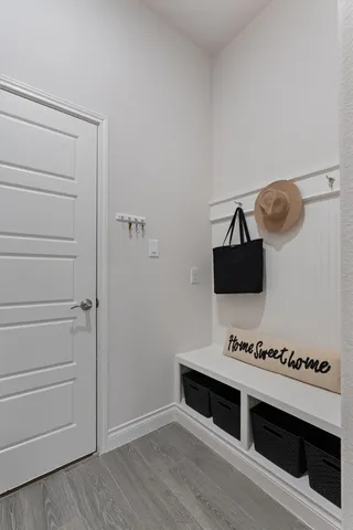 a living room with furniture and flat screen tv
