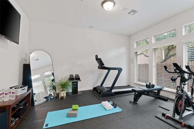 a view of a room with gym equipment