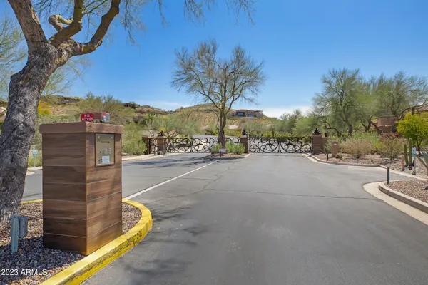 a view of a street with a building in the background