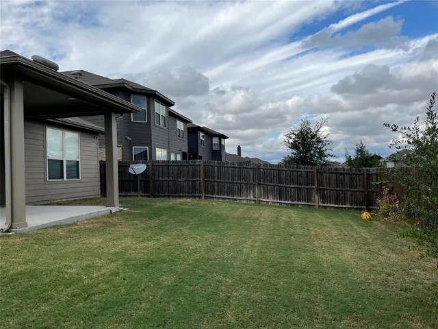 a house with yard in front of it