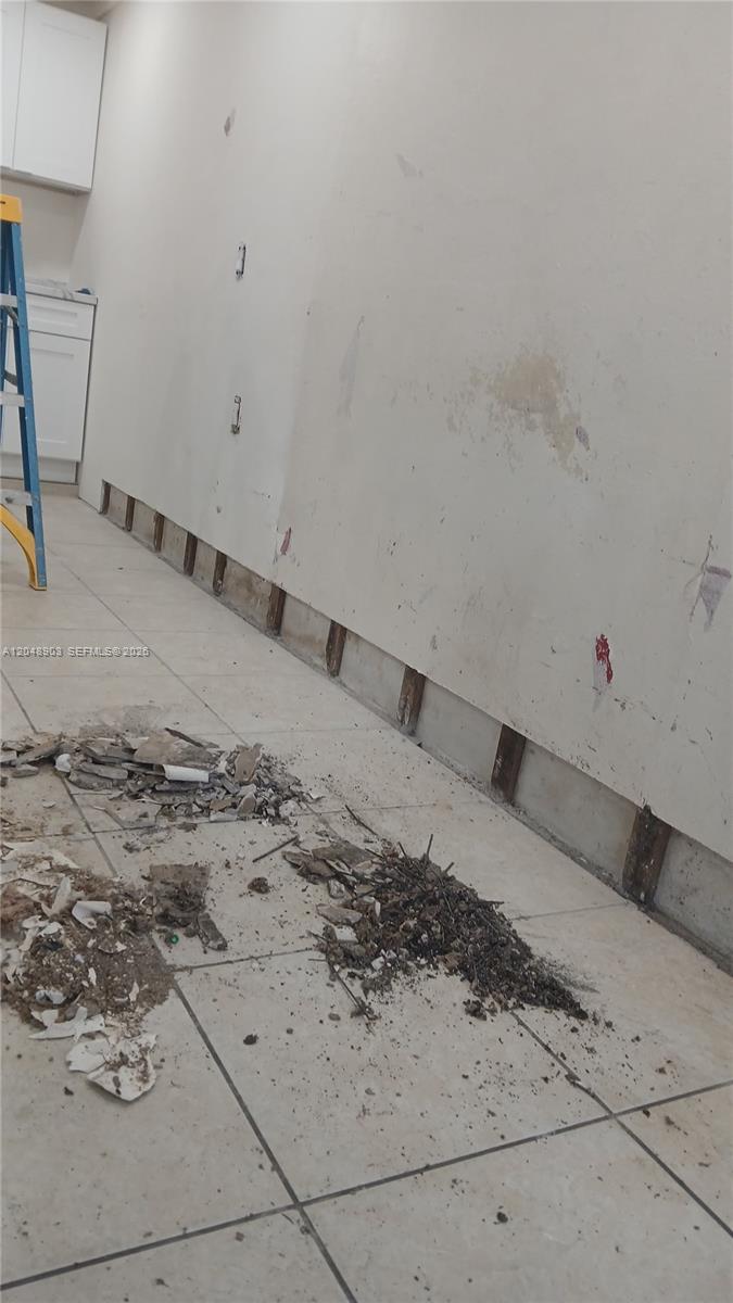 725 Southwest 1st Avenue, Unit 1 Homestead, FL 33030 - Photo 9 of 10 New Baseboards being put.