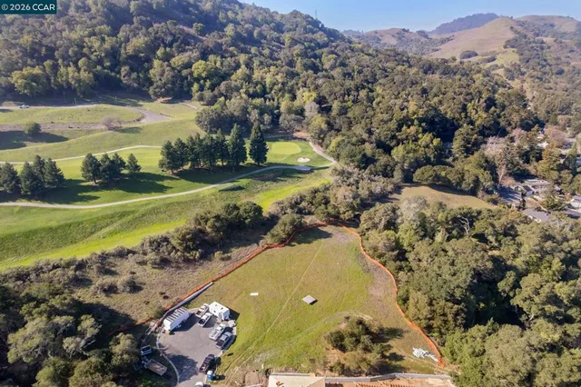 a view of a city with mountains in the background