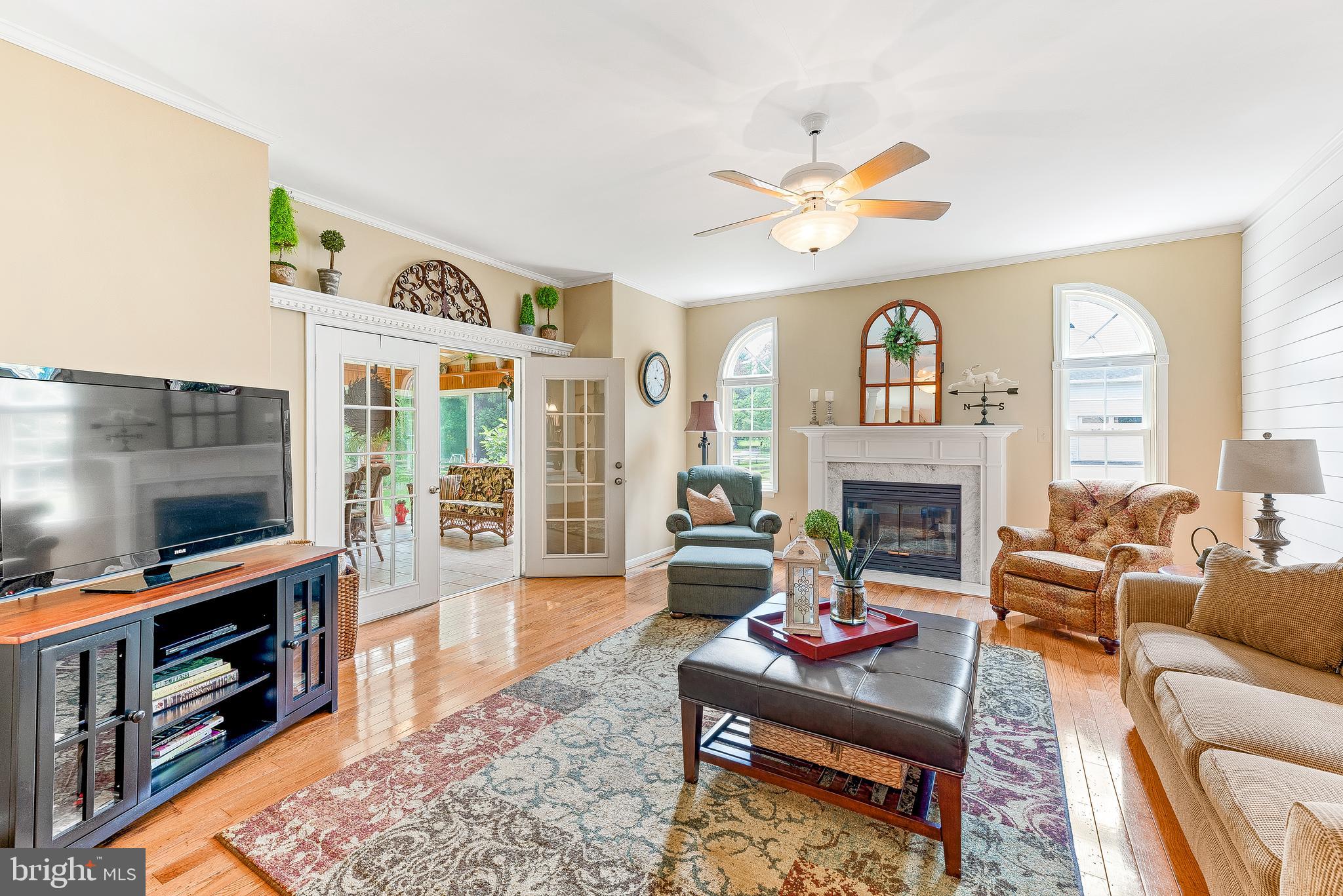 570 Small Reward Road Huntingtown, MD 20639 - Photo 27 of 64 Family Room w/Hardwood Floors...