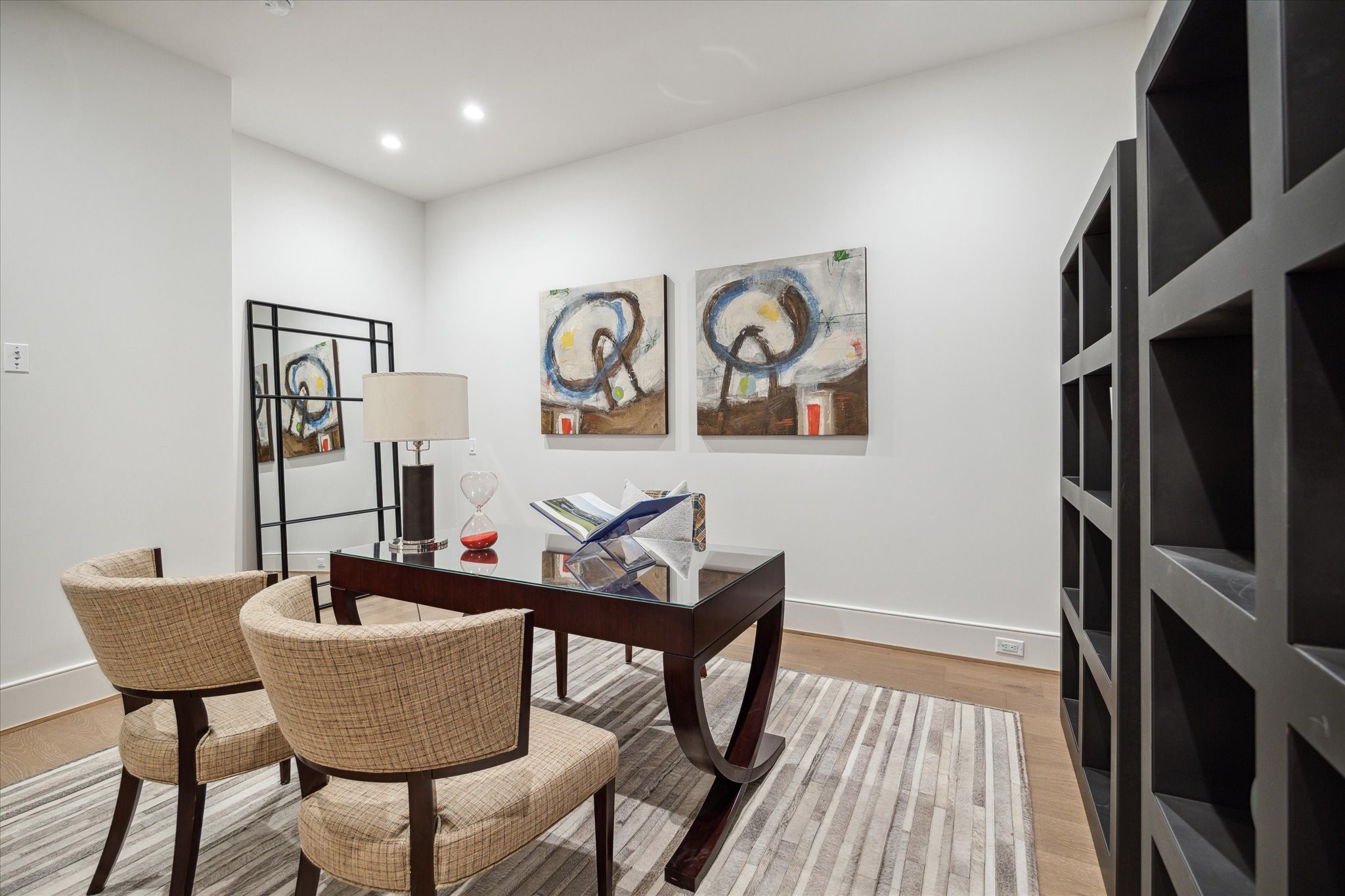 5656 San Felipe Street, Unit 701 Houston, TX 77056 - Photo 34 of 45 a dining room with furniture and wooden floor