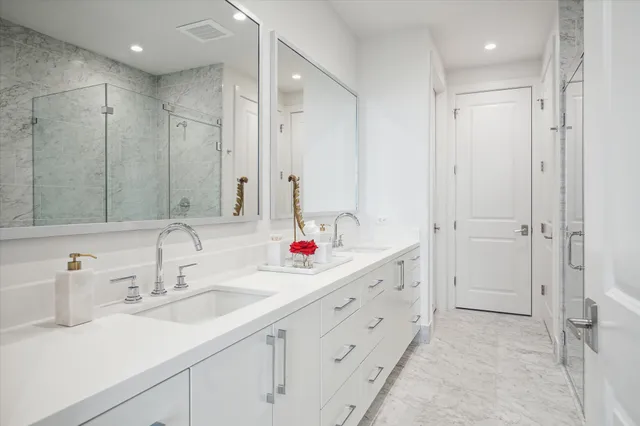 a living room with lots of furniture and a large window