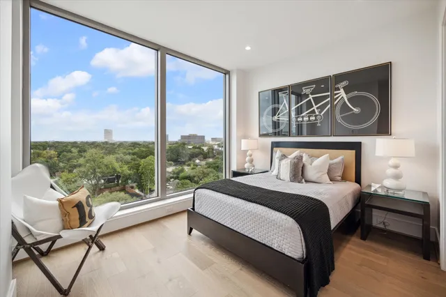 a view of a balcony with chairs and a table