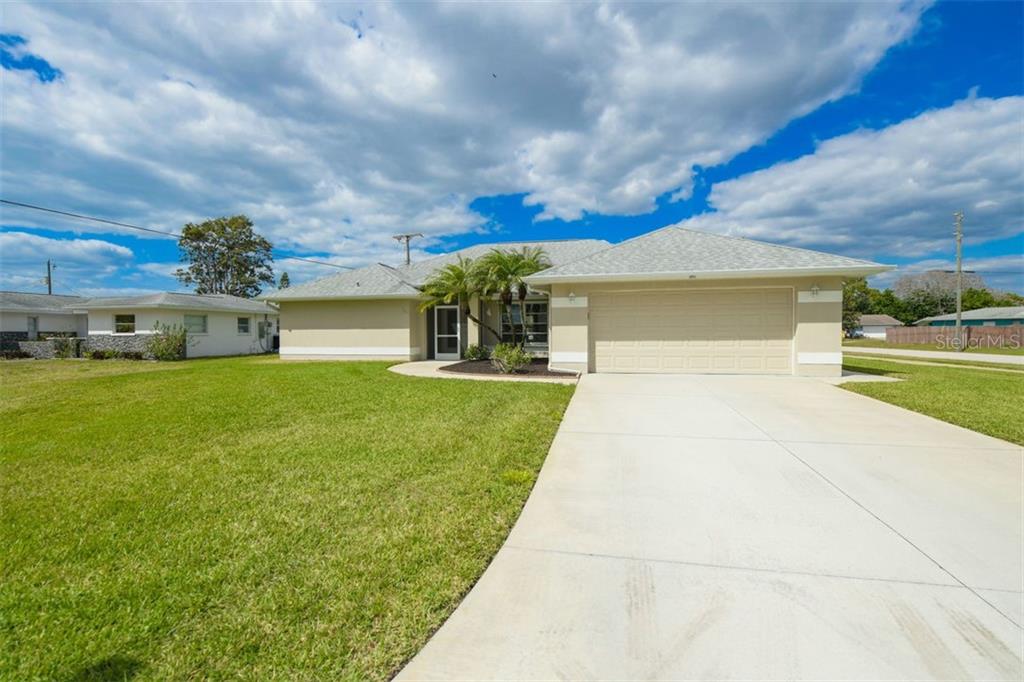 385 Pine Tree Road Venice, FL 34293 - Photo 1 of 1 a view of an outdoor space and a yard