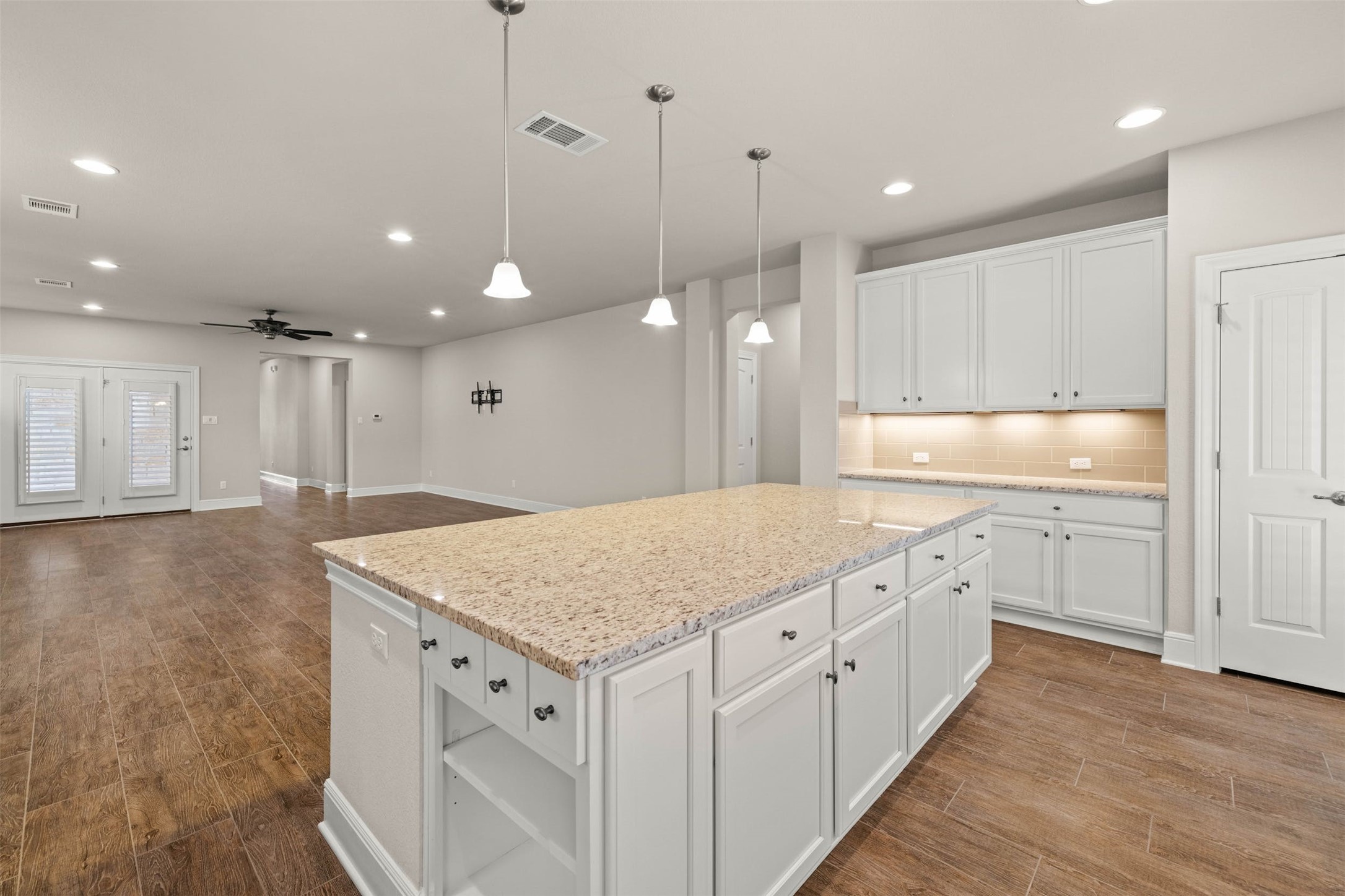 316 Crossvine Trail Georgetown, TX 78626 - Photo 18 of 37 a kitchen with a sink window and cabinets