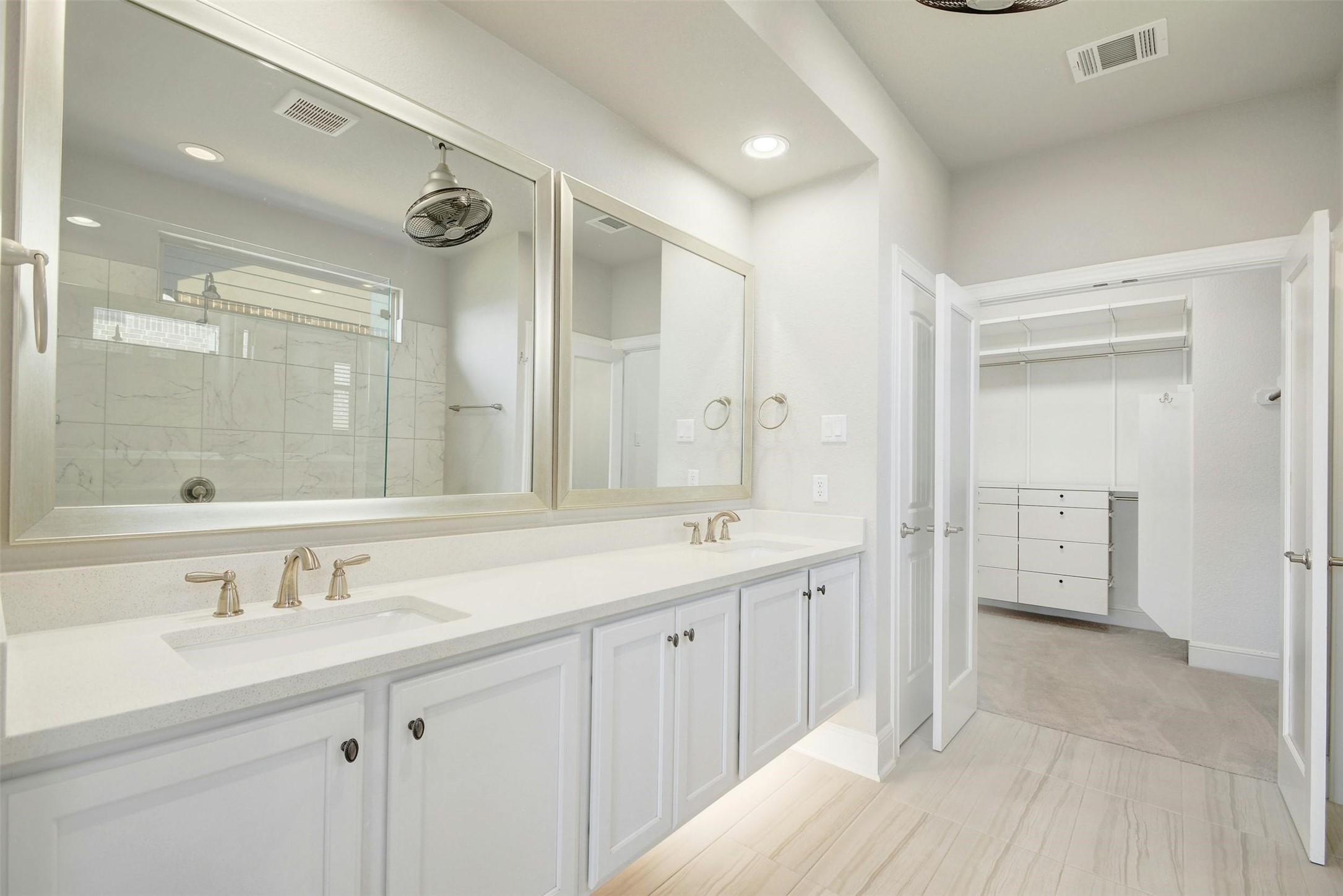 316 Crossvine Trail Georgetown, TX 78626 - Photo 21 of 37 a bathroom with a double vanity sink mirror and