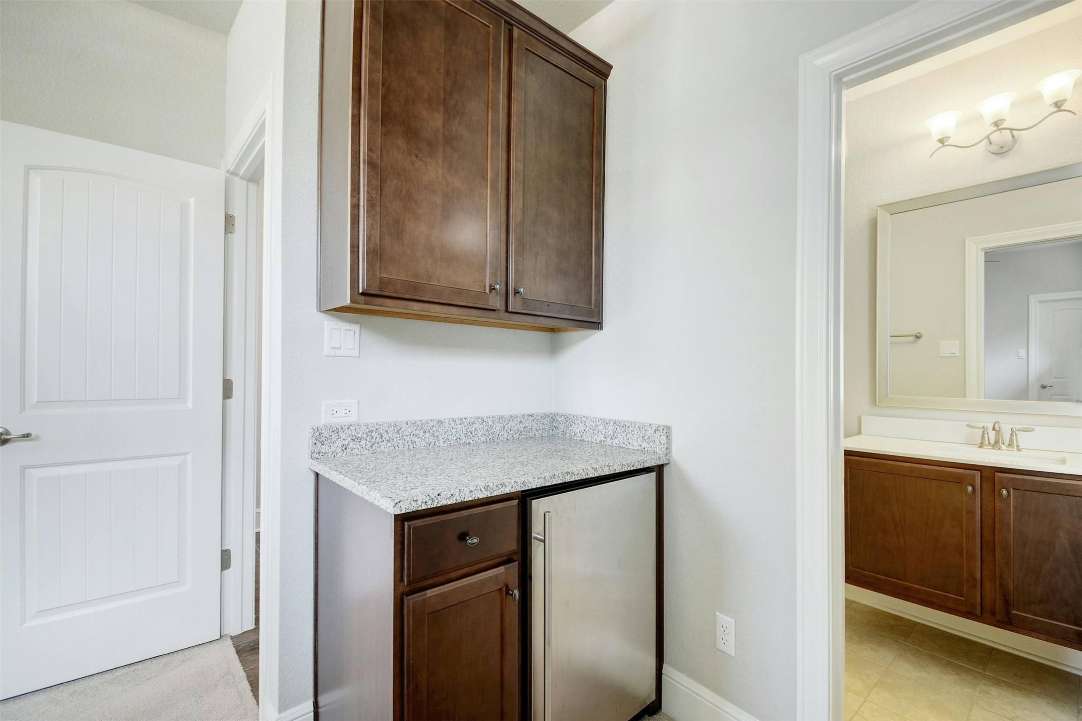 316 Crossvine Trail Georgetown, TX 78626 - Photo 29 of 37 a room with a sink and a mirror