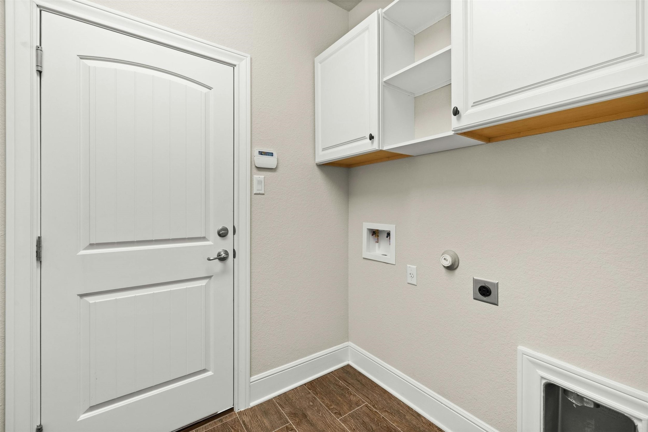 316 Crossvine Trail Georgetown, TX 78626 - Photo 31 of 37 a view of storage and utility room with closet