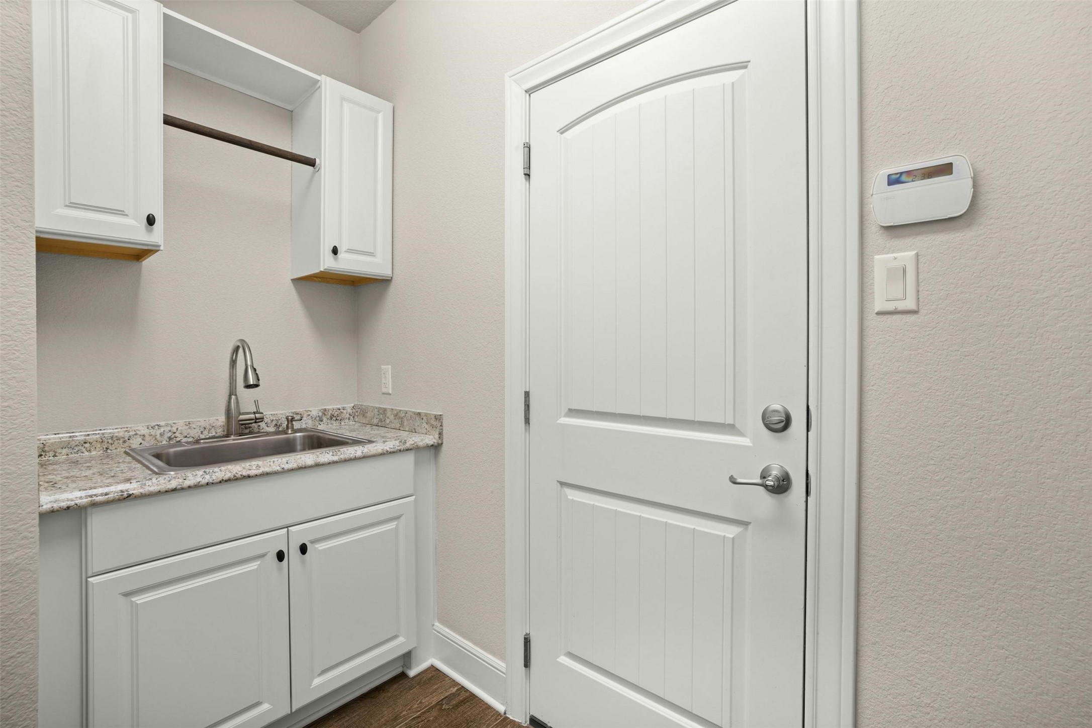 316 Crossvine Trail Georgetown, TX 78626 - Photo 32 of 37 a utility room with a sink