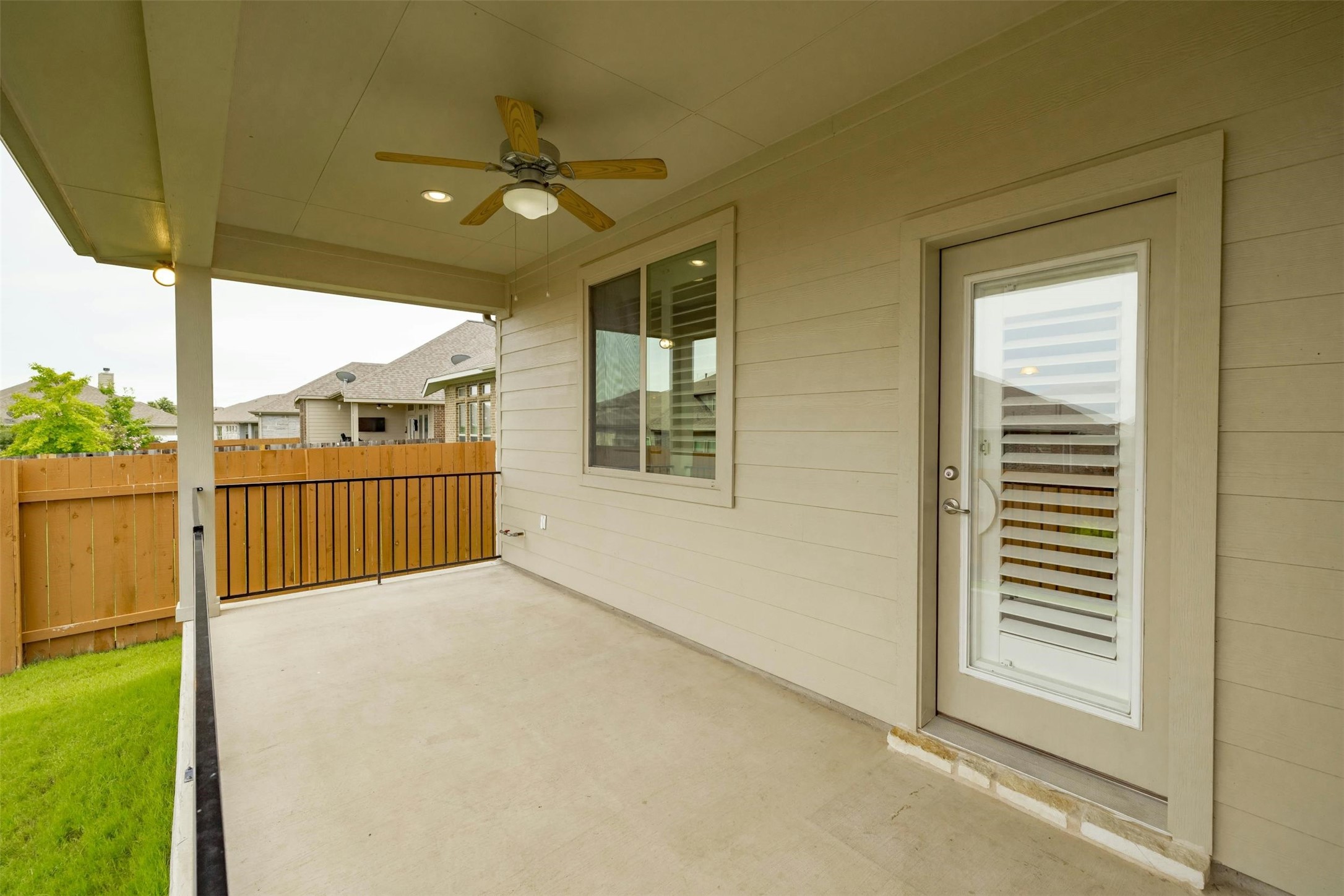 316 Crossvine Trail Georgetown, TX 78626 - Photo 35 of 37 a view of balcony with a floor to ceiling window and wooden fence