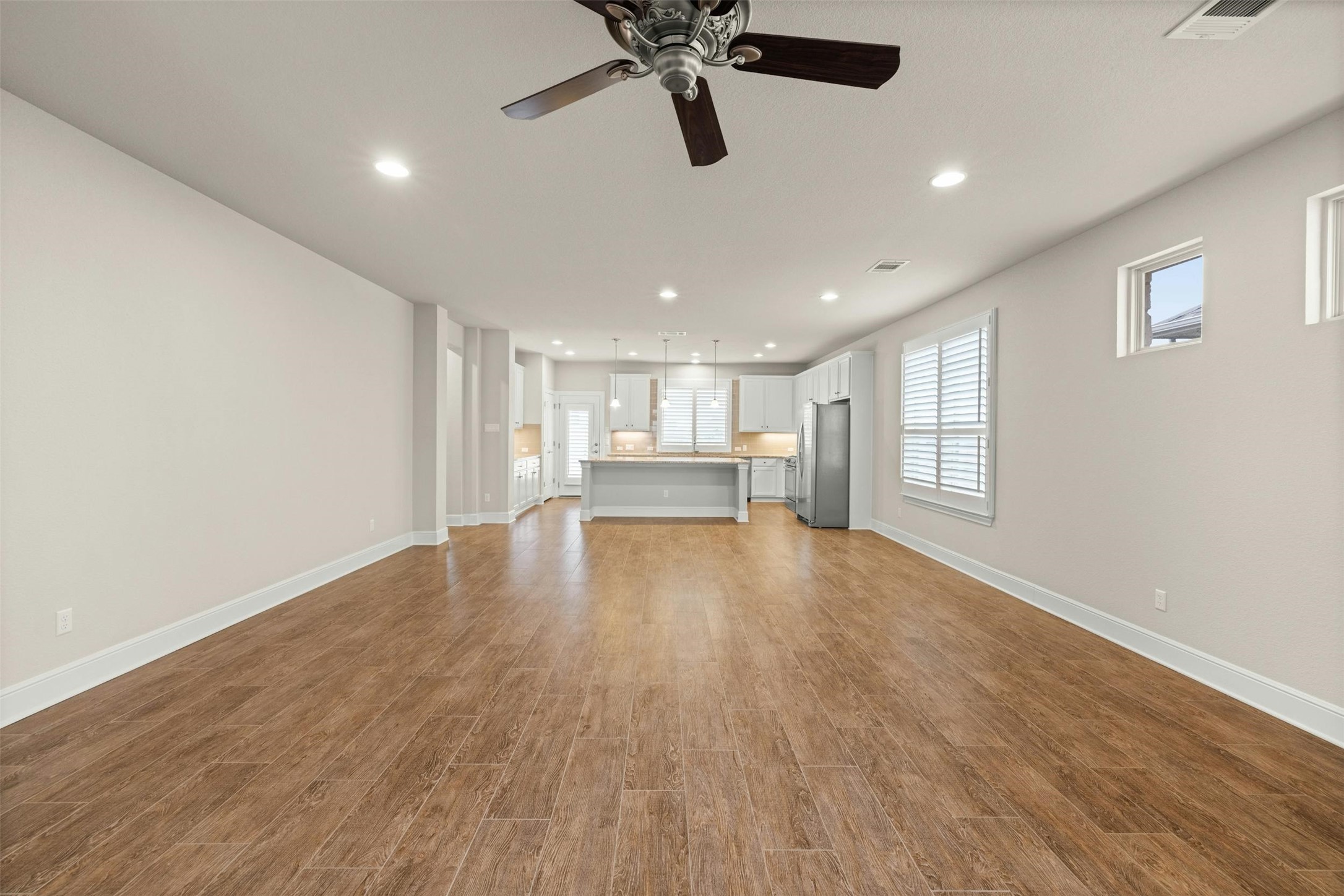 316 Crossvine Trail Georgetown, TX 78626 - Photo 9 of 37 a view of empty room with wooden floor