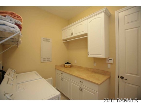 9 Remington Road Ormond Beach, FL 32174 - Photo 11 of 22 a bathroom with a sink and a mirror