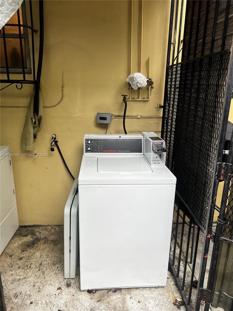 619 Southwest 11th Avenue, Unit 2 Miami, FL 33130 - Photo 9 of 10 a utility room with dryer and washer