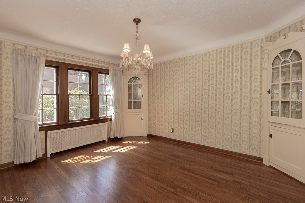 Traditional dining room with built in corner china cabinets