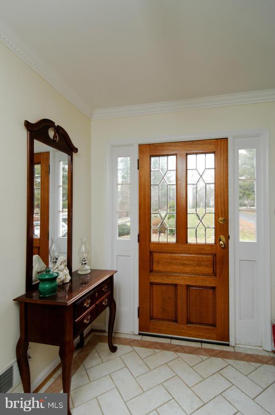 2721 Jones Road Dunkirk, MD 20754 - Photo 7 of 30 Tiled Foyer and leaded mahogany door