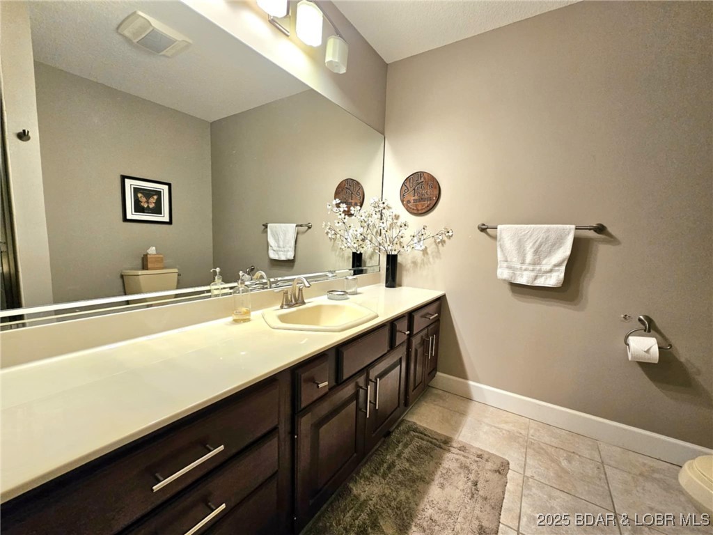 2299 Standing Rock Road Camdenton, MO 65020 - Photo 44 of 75 Lower Level Bath shared with bedroom 2 and 3.