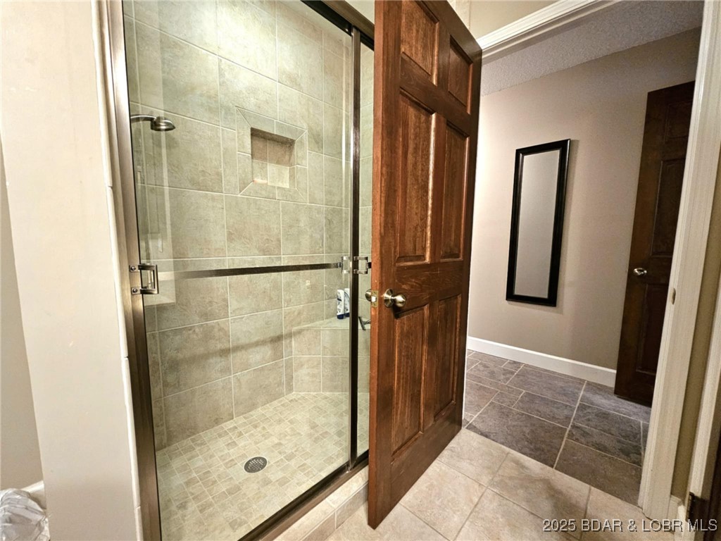 2299 Standing Rock Road Camdenton, MO 65020 - Photo 45 of 75 Lower Level Bath shared with bedroom 2 and 3.