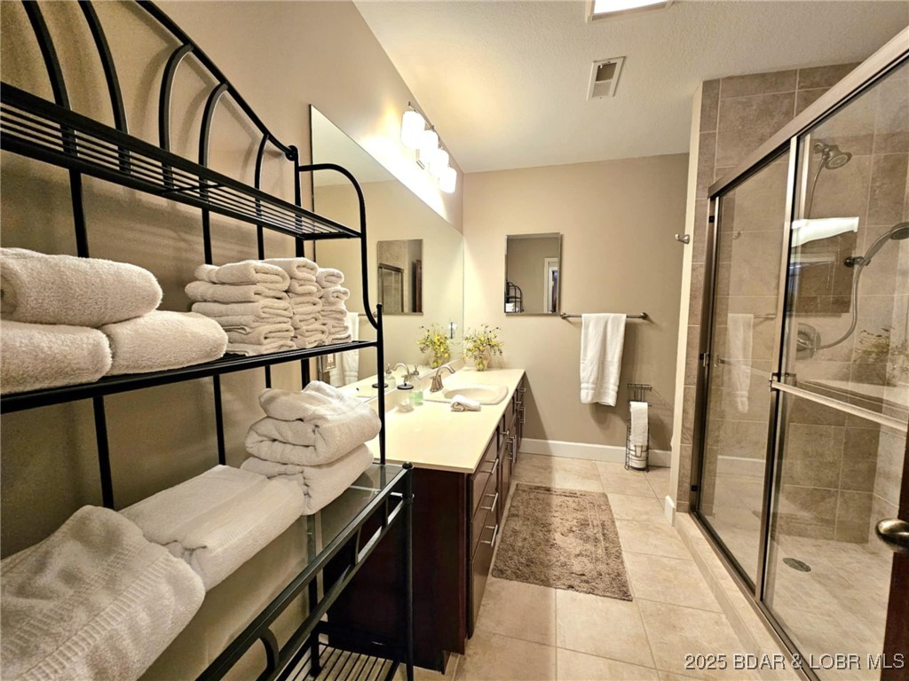 2299 Standing Rock Road Camdenton, MO 65020 - Photo 49 of 75 Lower Level Bath shared with bedroom 4 and 5.