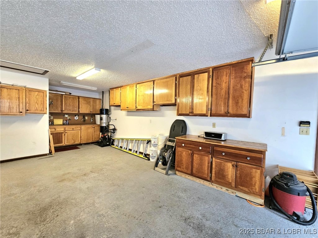 2299 Standing Rock Road Camdenton, MO 65020 - Photo 60 of 75 Workshop in oversized garage.