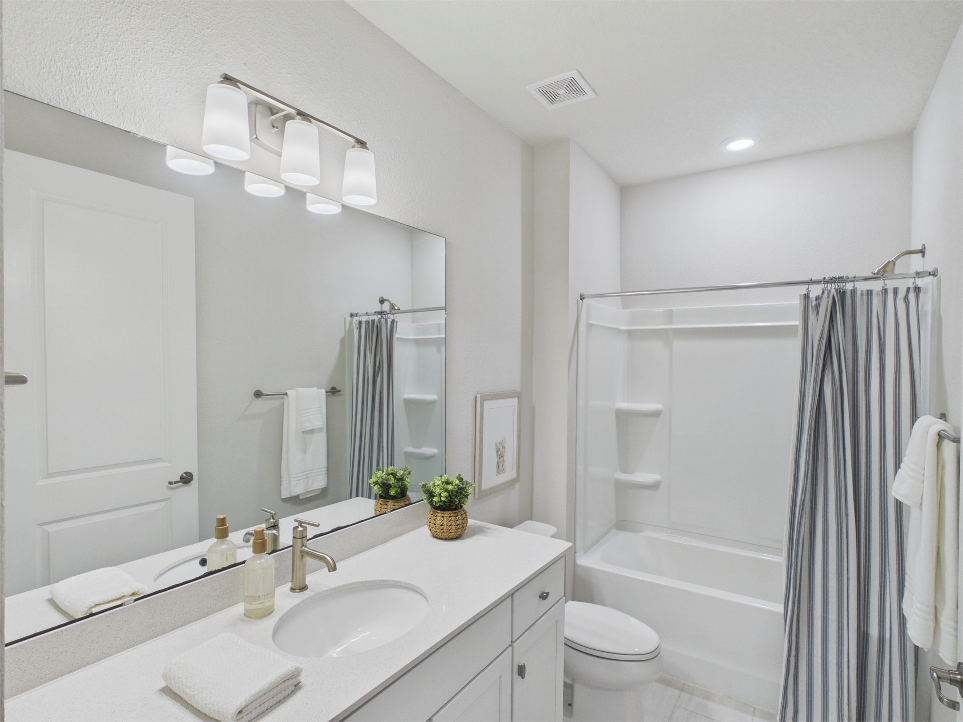 312 Salt Meadow Loop Yulee, FL 32097 - Photo 15 of 22 a bathroom with a granite countertop sink a toilet and shower