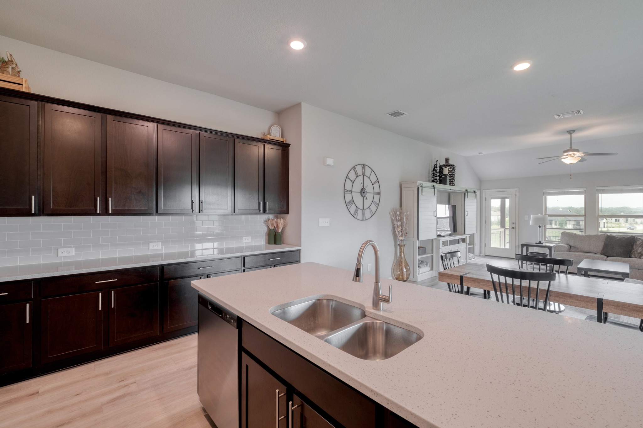 1000 Bright Star Cove Georgetown, TX 78628 - Photo 12 of 40 a kitchen with counter top space a sink and cabinets