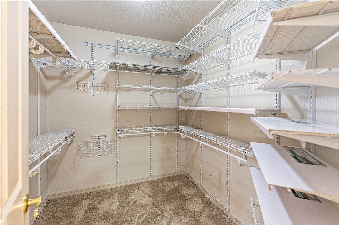 2940 Mountain Trail Road Kingman, AZ 86401 - Photo 22 of 53 a view of a room with racks on the wall