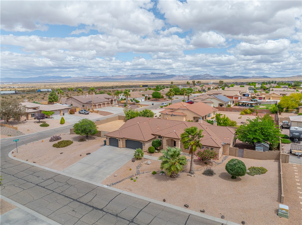 2940 Mountain Trail Road Kingman, AZ 86401 - Photo 39 of 53 an aerial view of a house with a garden